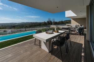 ALMOST HALF OF NEW LISBON GREEN VALLEY SALES WILL BE TO PEOPLE FROM ABROAD 