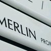 Apollo negotiates the purchase of 14 office buildings from Merlin 